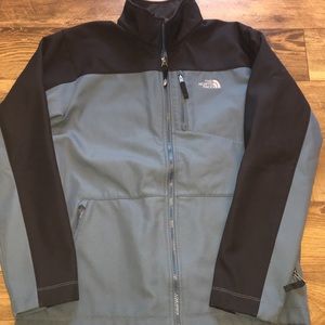 Women’s north face zip up jacket.